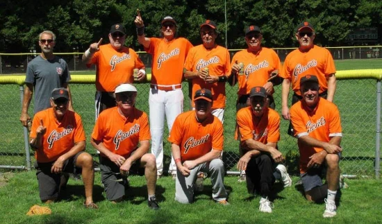 Players in a Portland 55+ senior softball league team photo